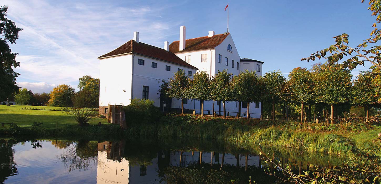 Brundlund Castle seen from the lake