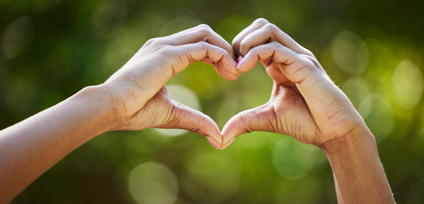Hænder der danner et hjerte