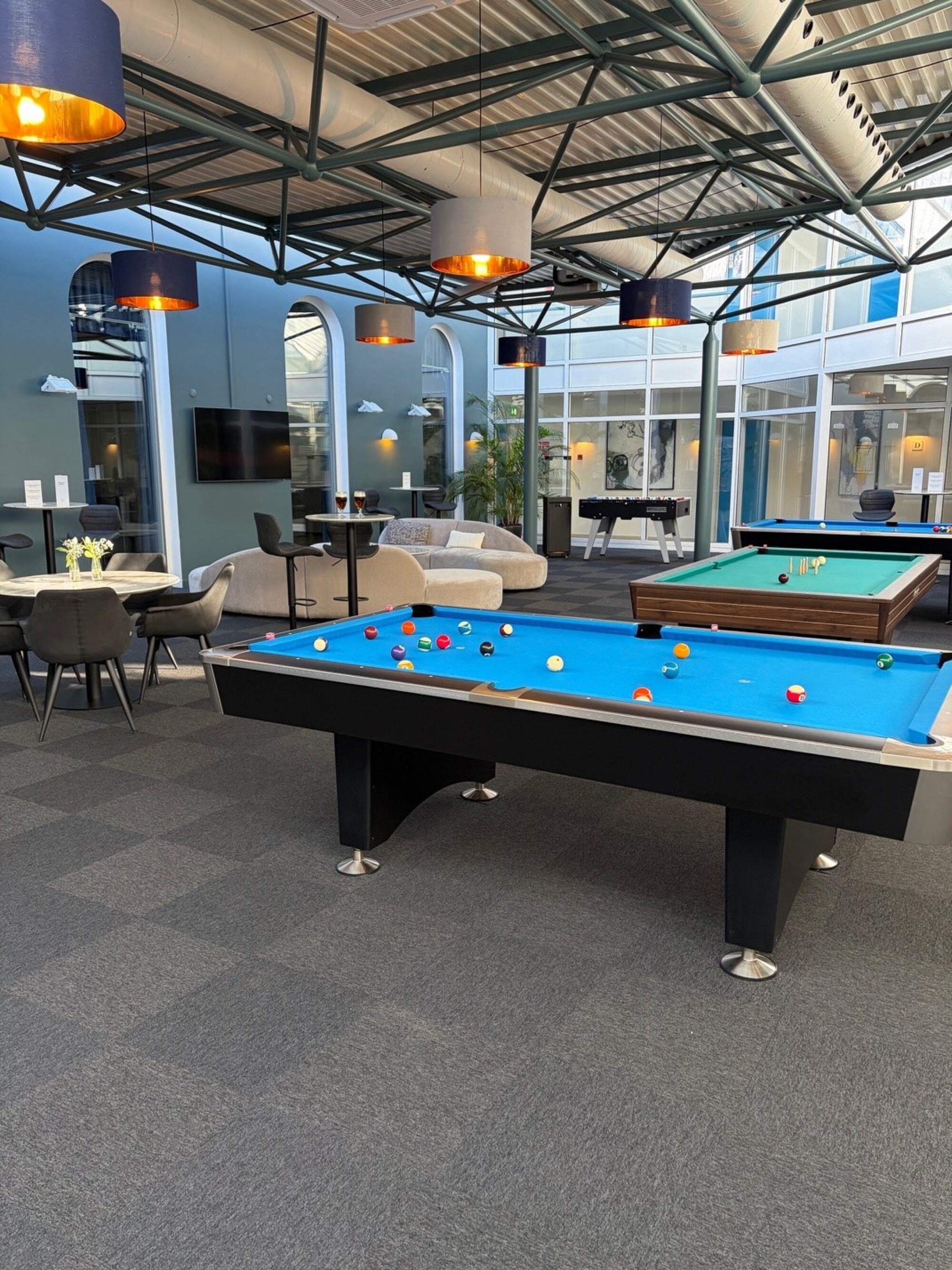 Lounge med indendørs aktiviteter ved Hotel Norden