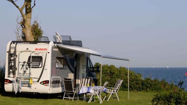 Campervans near the water at Drejby Strand Camping